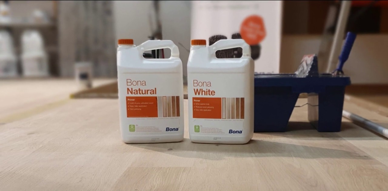 Wood Floor Sanding primers standing on freshly sanded solid oak floorboards in a Stamford Hill property.