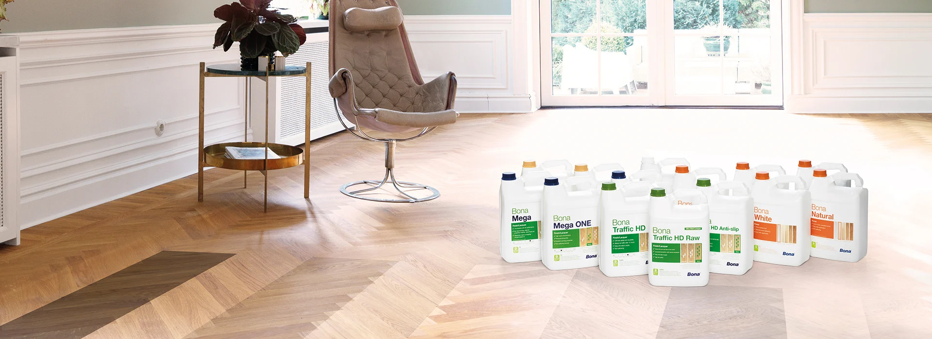 Parquet Floor Sanding in Stamford Hill on an oak chevron parquet floor, showing Bona finishing products used to seal and protect the restored surface.